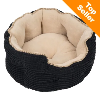 Panier rond pour animal en tissu noir et beige, mention Top Seller visible en haut à droite sur fond orange.