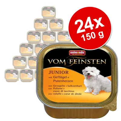 animonda Vom Feinsten Junior mit Geflügel + Putenherzen, 24 x 150 g. Opakowanie pokazuje psa i informacje o smaku: drób i serca z indyka. Widoczne wielopaki w tle.