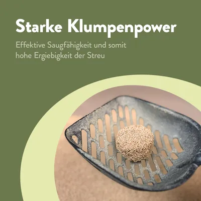 Starke Klumpenpower: Effektive Saugfähigkeit und somit hohe Ergiebigkeit der Streu. Abgebildet ist ein Klumpen auf einer Streuschaufel.