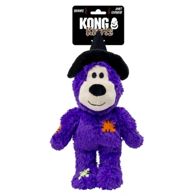 KONG KIRTS giocattolo in peluche viola con cappello da strega, cuciture visibili. La confezione mostra: Squeaks, Jouet Couineur. KONG KIRTS giocattolo in peluche viola con cappello da strega, cuciture visibili. La confezione mostra: Squeaks, Jouet Couineur.