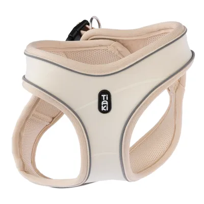 Pettorina beige Tiaki per cani con tessuto mesh traspirante e strisce rifrangenti, adatta per una presa sicura e comfort.