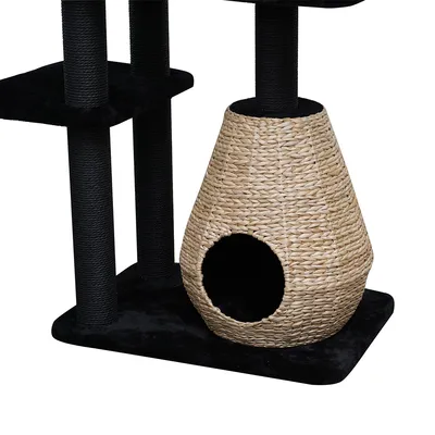Cat tree with black fabric cover, sisal-wrapped posts and a woven cave made of natural material with a round entrance.