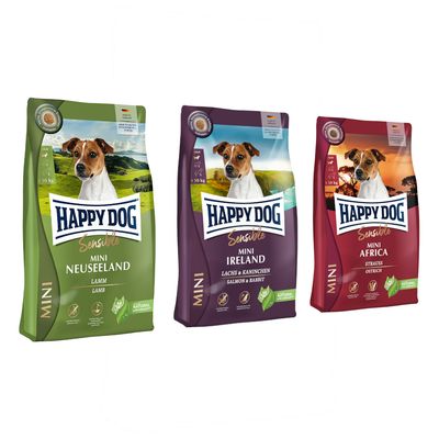 Tři balení Happy Dog Mini: Africa Strauss & Kartoffel, Neuseeland Lamm & Reis, Irland Lachs & Kaninchen. Pro dospělé psy 1–10 kg. Made in Germany.