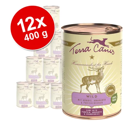 Terra Canis dåsefoder til hunde, variant Wild med græskar, amarant og tranebær. Pakke med 12 x 400 g. Synlig tekst: 'Hausmannskost für Hunde', '100 % Natur'.