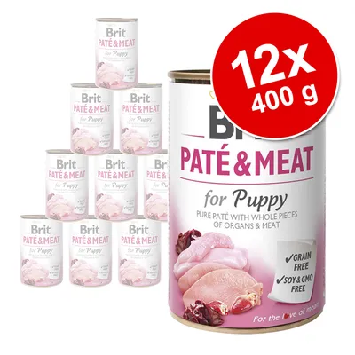 Set 12x400 g Brit Paté & Meat for Puppy, pate cu bucăți de organe și carne. Text vizibil: Grain free, Soy & GMO free. Pentru pui de câine.