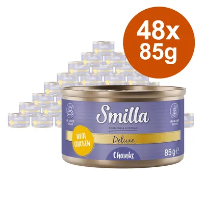 Lot de 48 boîtes Smilla Deluxe Chunks with Chicken, 85 g chacune. Texte visible : no added sugar, grainfree recipe. Lot de 48 boîtes Smilla Deluxe Chunks with Chicken, 85 g chacune. Texte visible : no added sugar, grainfree recipe.