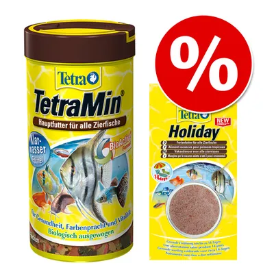 TetraMin huvudfoder för akvariefiskar och Tetra Holiday semestermat, båda med synliga fiskbilder och märkning. Röd procentsymbol visar rabatt eller erbjudande. TetraMin huvudfoder för akvariefiskar och Tetra Holiday semestermat, båda med synliga fiskbilder och märkning. Röd procentsymbol visar rabatt eller erbjudande.