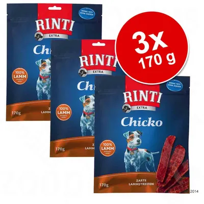 Trzy opakowania Rinti Extra Chicko 100% Lamm, każde 170 g. Widoczny napis: 'wenig Fett ohne Zucker'. Na czerwonym kole: 3×170 g.