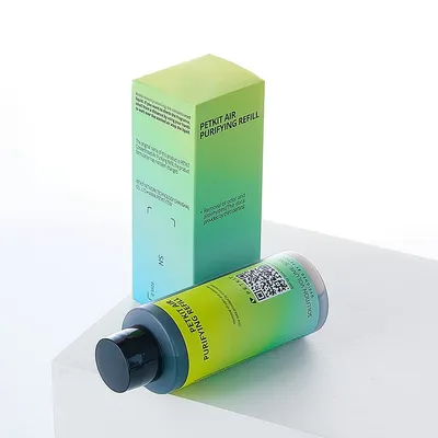 PETKIT Air Purifying Refill, wkład uzupełniający do usuwania zapachów i oczyszczania powietrza. Widoczne opakowanie i butelka produktu z kodem QR.
