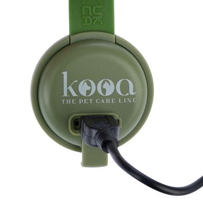 kooa. Premium-Pflegemarke für Haustiere, grünes Gerät mit Kabelanschluss.