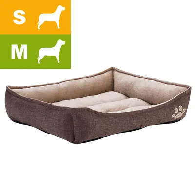 Hnědý pelíšek pro psy s béžovým vnitřkem, velikosti S a M zobrazené ikonami psa a písmeny v levém horním rohu, výšivka tlapky na boku. Hnědý pelíšek pro psy s béžovým vnitřkem, velikosti S a M zobrazené ikonami psa a písmeny v levém horním rohu, výšivka tlapky na boku.