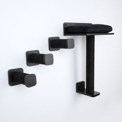 Wall-mounted scratching post set made of black wood and sisal, includes three climbing steps and a lying surface with padded cushion.