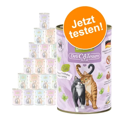 DeliCATessen cat food, lamb & turkey variety. Grain-free, pomegranate, salmon oil, made in Germany. Stack with more cans visible. DeliCATessen cat food, lamb & turkey variety. Grain-free, pomegranate, salmon oil, made in Germany. Stack with more cans visible.