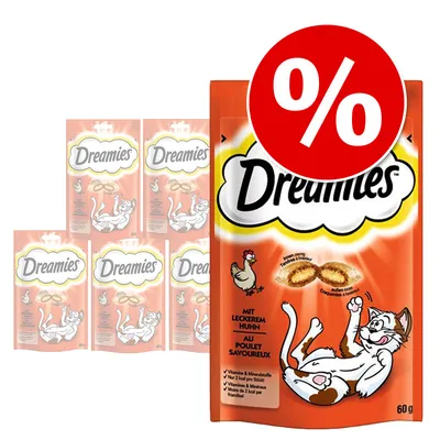 Flera förpackningar Dreamies kattgodis kyckling 60 g, synlig text: 'mit leckerem Huhn', röd cirkel med procenttecken indikerar rabatt eller kampanj. Flera förpackningar Dreamies kattgodis kyckling 60 g, synlig text: 'mit leckerem Huhn', röd cirkel med procenttecken indikerar rabatt eller kampanj.
