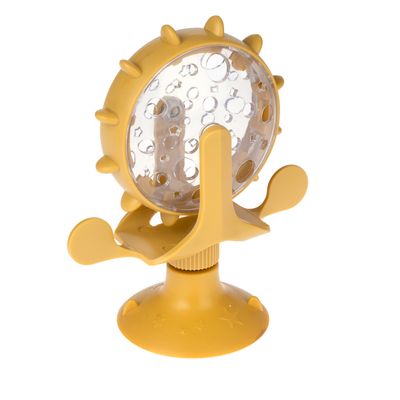 Jouet interactif pour animaux en plastique jaune avec ventouse, roue transparente à picots et motifs d’étoiles visibles sur la base.