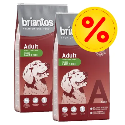Twee zakken briantos Premium Dog Food Adult Tender Lamb & Rice, 14 kg, met zichtbaar kortingssymbool. Tekst: High Quality Animal Protein, Easily Digested, Very Tasty, High Tolerance.