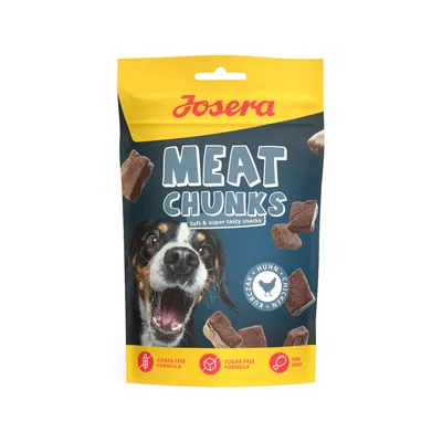 Josera Meat Chunks, sachet avec morceaux de viande, mentions visibles : grain free formula, sugar free formula, 90% meat, poulet. Texte en anglais et allemand sur l'emballage.