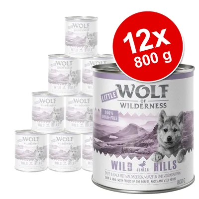 Zestaw 12 puszek po 800 g Little Wolf of Wilderness Wild Hills, widoczne napisy: 100% grain-free, Junior, kaczka i cielęcina z owocami lasu, korzeniami i ziołami leśnymi.