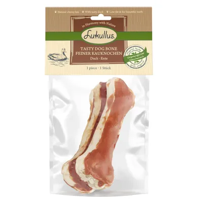 Lukullus Tasty Dog Bone feiner Kauknochen Ente, 1 Stück, Originalgeschmack, fettarm, für schöne Zähne. Verpackung mit Knochen sichtbar. Lukullus Tasty Dog Bone feiner Kauknochen Ente, 1 Stück, Originalgeschmack, fettarm, für schöne Zähne. Verpackung mit Knochen sichtbar.