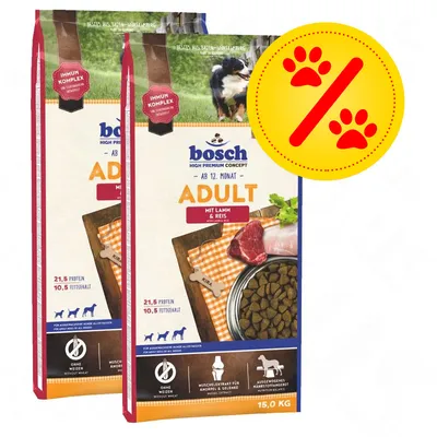 Lot de 2 sacs Bosch Adult mit Lamm & Reis, 15 kg chacun, pour chiens adultes. Texte visible : 21,5 % protéines, 10,5 % matières grasses. Signe promotionnel avec pattes.