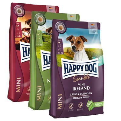 Trois sacs de croquettes Happy Dog Sensible Mini pour chiens adultes jusqu’à 10 kg, variantes visibles : Ireland Lachs & Kaninchen, Natural Life Concept, mentions en anglais et allemand.