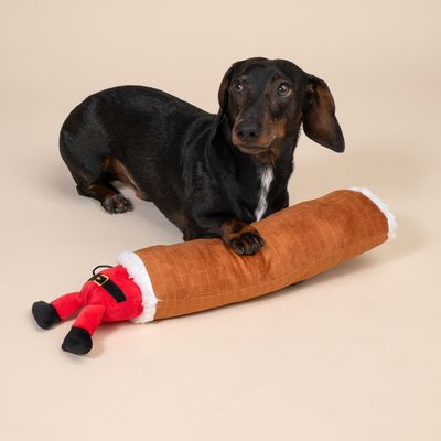 Gioco per cani TIAKI Babbo Natale in un camino