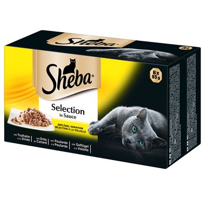 Embalagem Sheba Selection in Sauce, 8 x 85 g. Variação de aves: peru, pato, frango, aves. Texto visível em alemão, francês e inglês. Imagem de um gato cinzento e comida húmida.
