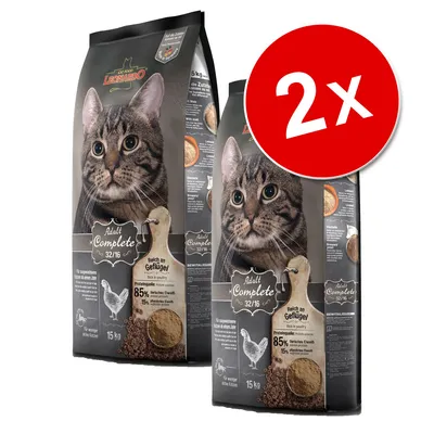 Lot de 2 sacs Leonardo Cat Food Adult Complete 32/16, riche en volaille, 85 % protéines animales, 15 kg chacun. Image d’un chat sur l’emballage. Inscription « 2x » en rouge.