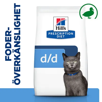Hill's Prescription Diet d/d kattfoder, text: FODERÖVERKÄNSLIGHET, bild på grå katt och grön anka-symbol synlig på förpackningen.