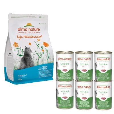 Croquettes almo nature Life Maintenance pour chat adulte 2 kg, avec poisson frais, et 6 boîtes Natural HFC thon du Pacifique. Marques et textes visibles sur les emballages.