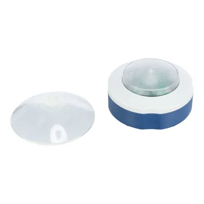 Two parts of an LED lighting system: a transparent suction cup cover and a blue-white housing with a clear dome.