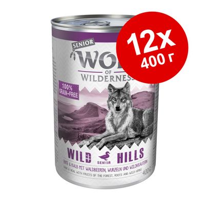 Консервы Wolf of Wilderness Senior Wild Hills, 12×400 г. Надписи: 100% grain-free, утка и телятина с лесными ягодами, корнями и дикими травами. Изображение волка.