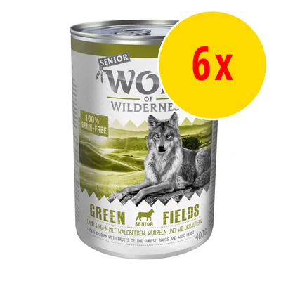 Wolf of Wilderness Senior Green Fields, 100 % grain-free, lamm & kyckling, 400 g burk. Förpackning med 6x enligt gul cirkel med röd text.