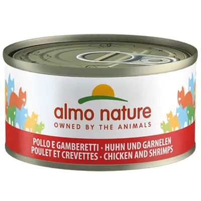 Almo Nature burk med kyckling och räkor. Text: 'Owned by the Animals'. Flerspråkig produktbeskrivning på röd etikett.