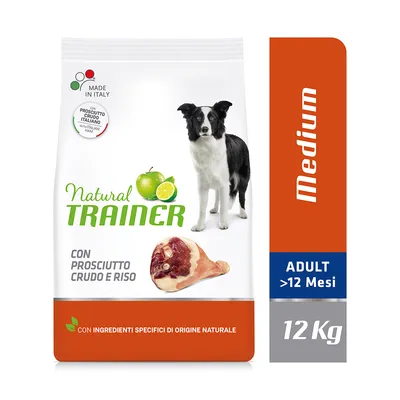 Natural Trainer hundefoder, Medium, ADULT >12 Mesi, 12 kg. Tekst: con prosciutto crudo e riso, con ingredienti specifici di origine naturale. Billede af hund, skinke og frugt.