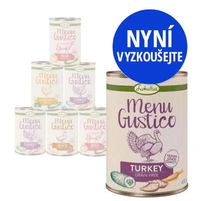 Konzervy Lukullus Menu Gustico, příchutě Turkey, Beef, Chicken, Duck. Velká konzerva s textem 'Menu Gustico Turkey Grain-Free'. Modrý kruh: NYNÍ VYZKOUŠEJTE.