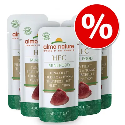 Almo Nature HFC Mini Food, Adult Cat, Tuna Fillet. Zestaw kilku opakowań z widocznym symbolem procentowym oznaczającym promocję.