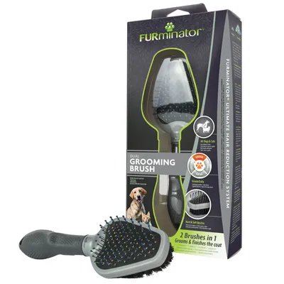 FURminator Dual Grooming Brush -harja pakkauksessa ja esillä, näkyvissä tekstit: Dual Grooming Brush, 2 Brushes in 1, Hard & Soft Bristles, All Dogs & Cats. Harjassa muovinen varsi.