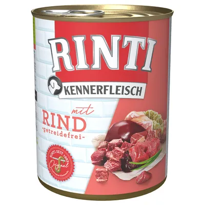 Konzerva Rinti Kennerfleisch mit Rind, getreidefrei. Na etikete sú kúsky hovädzieho mäsa a pečene, červený odznak s textom Rinti seit 1983 Original.