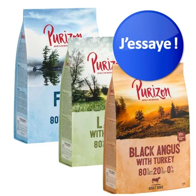 Trois sacs de croquettes Purizon visibles : Fish, Lamb with Chicken, Black Angus with Turkey 80 % 20 % 0 %. Pastille bleue avec texte « J’essaie ! » en haut à droite. Trois sacs de croquettes Purizon visibles : Fish, Lamb with Chicken, Black Angus with Turkey 80 % 20 % 0 %. Pastille bleue avec texte « J’essaie ! » en haut à droite.