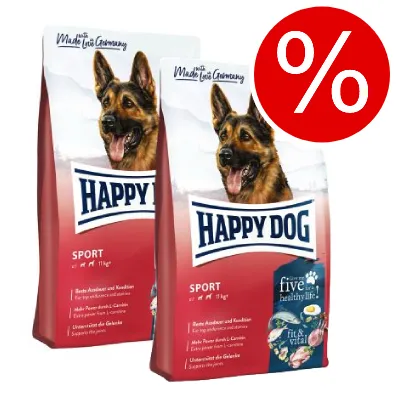 Två påsar Happy Dog Sport hundfoder, text: 'Made with Love in Germany', 'five in 1 healthy life', röd procent-symbol för rabatt uppe till höger. Två påsar Happy Dog Sport hundfoder, text: 'Made with Love in Germany', 'five in 1 healthy life', röd procent-symbol för rabatt uppe till höger.
