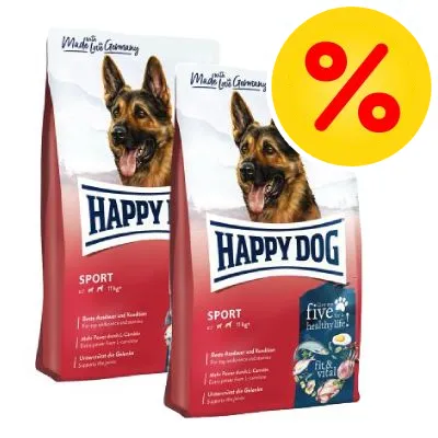 Två förpackningar Happy Dog Sport hundfoder med schäferbild, texten 'five for a healthy life', röd rabattprocent-symbol uppe till höger.