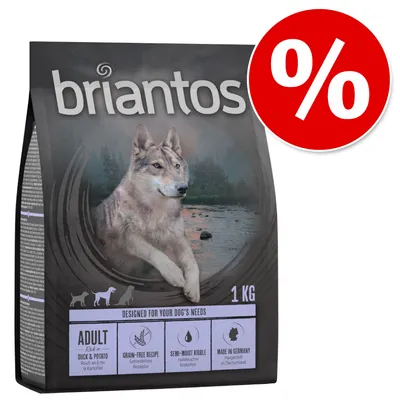 Briantos suha hrana za pse, 1 kg. Vidljiv natpis: Adult, duck & potato, grain-free recipe, semi-moist kibble, made in Germany. Crveni simbol postotka za akciju/popust. Briantos suha hrana za pse, 1 kg. Vidljiv natpis: Adult, duck & potato, grain-free recipe, semi-moist kibble, made in Germany. Crveni simbol postotka za akciju/popust.