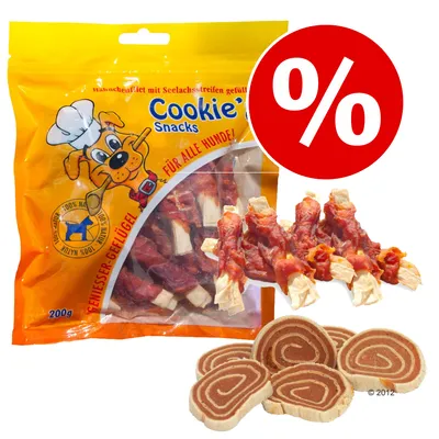 Cookie's Snacks -koiranherkkupussi, 200 g. Pakkauksessa näkyy koirahahmo ja teksti 'FÜR ALLE HUNDE!'. Edessä esillä erilaisia herkkupaloja. Punainen prosenttimerkki alennukselle.