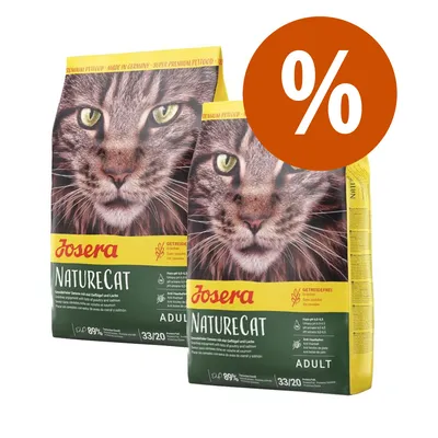 Due confezioni di Josera NatureCat Adult con immagine di gatto, scritte visibili: 'Josera', 'NatureCat', 'ADULT', simbolo percentuale bianco su cerchio arancione in alto a destra.