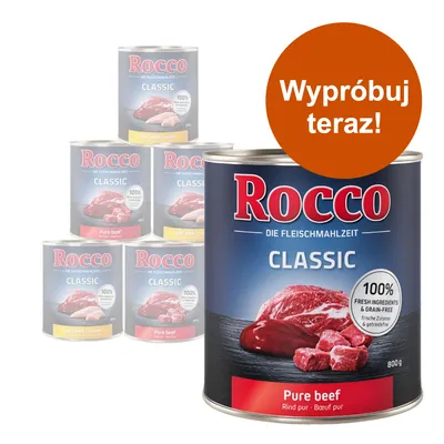 Rocco Classic Pure beef, 800 g. Widoczne puszki różnych smaków Rocco Classic. Napis na pomarańczowym kole: Wypróbuj teraz! Tekst na etykiecie: 100% fresh ingredients & grain-free.
