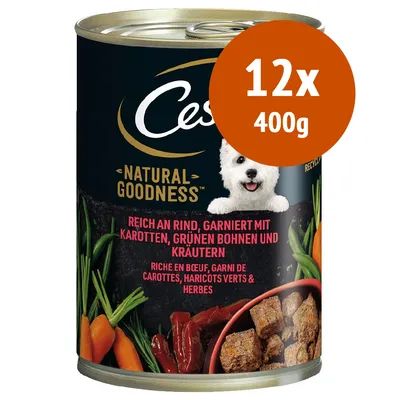 Cesar Natural Goodness, confezione da 12x400g. Testo visibile: reich an rind, garniert mit karotten, grünen bohnen und kräutern. Immagine di manzo, carote, fagiolini e ciotola con bocconcini. Cesar Natural Goodness, confezione da 12x400g. Testo visibile: reich an rind, garniert mit karotten, grünen bohnen und kräutern. Immagine di manzo, carote, fagiolini e ciotola con bocconcini.