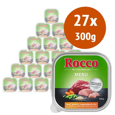 27 vaschette da 300 g di Rocco Menu, carne, pollame, verdure e riso. Testo visibile: 'ENRICHED WITH CARBOHYDRATES', 'Beef, poultry, vegetables & rice'.