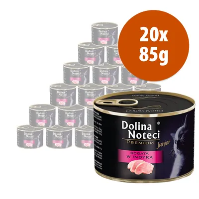 Dolina Noteci Premium Junior, confezione 20x85g, visibile scritta 'BOGATA W INDYKA' su lattina con immagine di gatto e carne rosa.