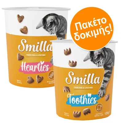 Δύο συσκευασίες Smilla Hearties και Smilla Toothies για γάτες, 125g η καθεμία. Ορατό κείμενο: Πακέτο δοκιμής! Food for a lifetime. Supports dental care. Made in Germany.